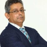 Dr Nigel P Symss